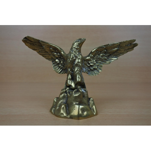 948 - A brass figure of an eagle.