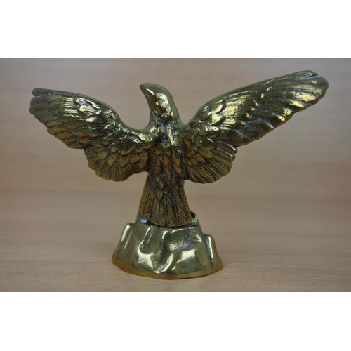 948 - A brass figure of an eagle.