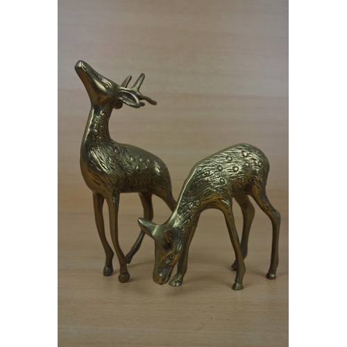 951 - A pair of vintage brass deer figures.