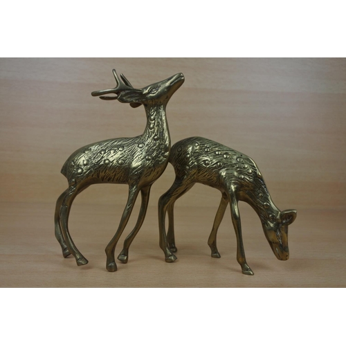 951 - A pair of vintage brass deer figures.