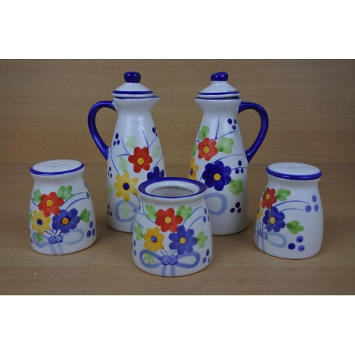 1107 - A new pottery condiment set.