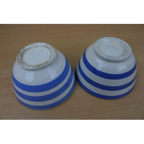 1130 - Two vintage blue and white striped bowls.