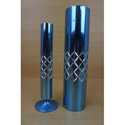 1131 - Two vintage metal diamond cut vases.