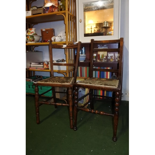 1138 - A pair of antique oak framed bedroom chairs.