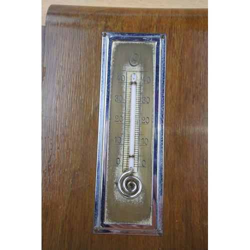 1151 - An unusual vintage framed barometer in German.