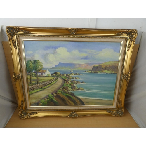 515 - A stunning gilt framed oil painting 'The Coast Road' signed JJ O'Neill, measuring 75x60cm.