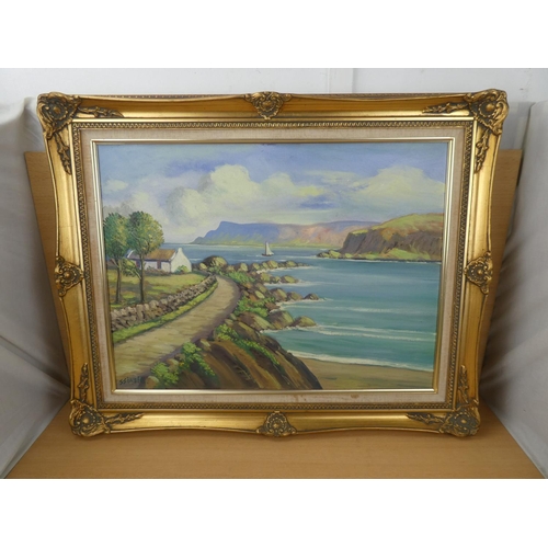 515 - A stunning gilt framed oil painting 'The Coast Road' signed JJ O'Neill, measuring 75x60cm.