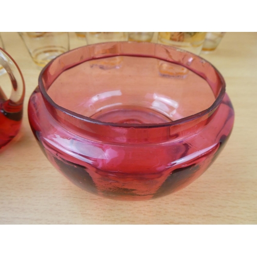 522 - An antique ruby glass bowl and jug and two sets of vintage glasses.