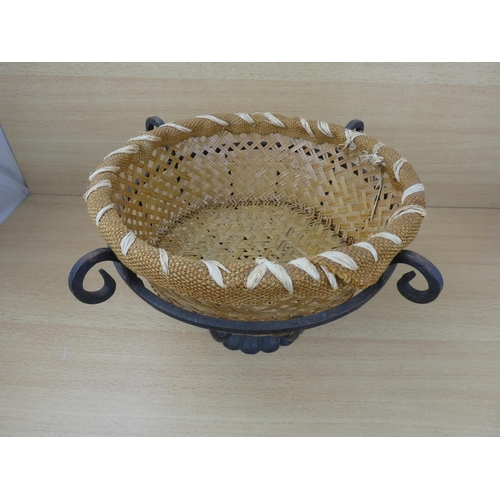 523 - A metal fruit basket and a rattan basket.