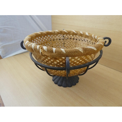 523 - A metal fruit basket and a rattan basket.