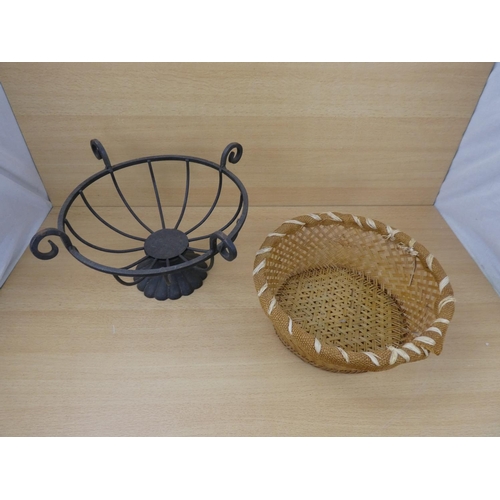 523 - A metal fruit basket and a rattan basket.