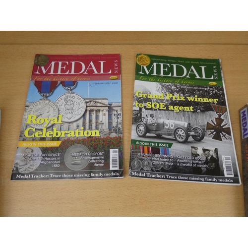 531 - Two Medal Yearbooks dated 2011 and 2020 and two similar magazines.