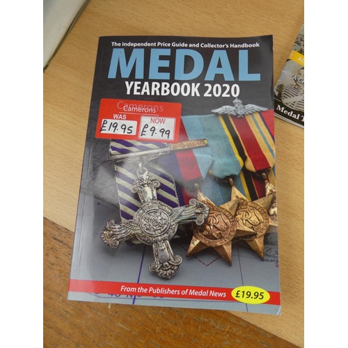 531 - Two Medal Yearbooks dated 2011 and 2020 and two similar magazines.