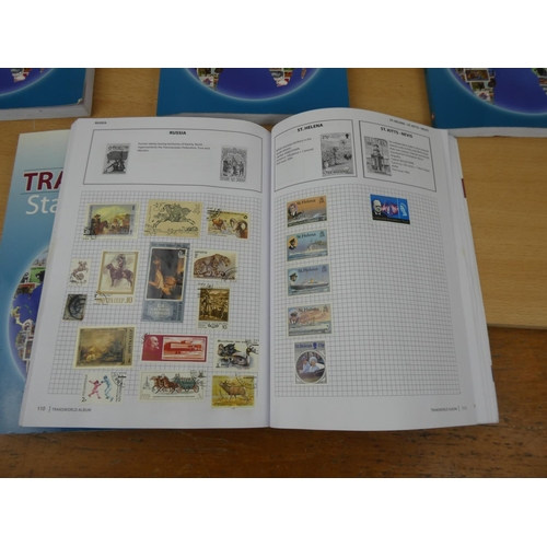 533 - Five Stanley Gibbons 'Transworld Stamp Albums' and contents.