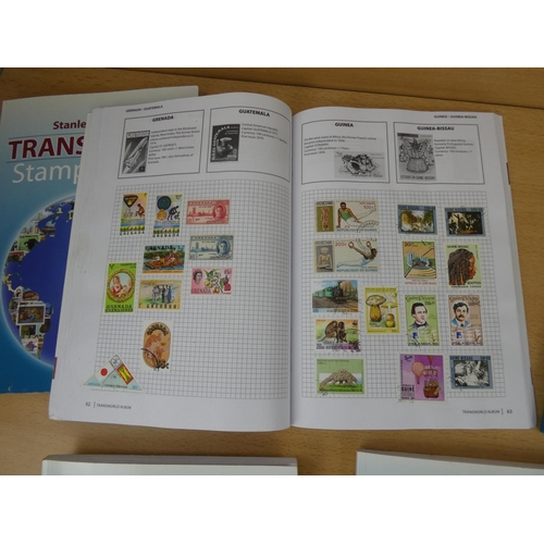 534 - Five Stanley Gibbons 'Transworld Stamp Albums' and contents.