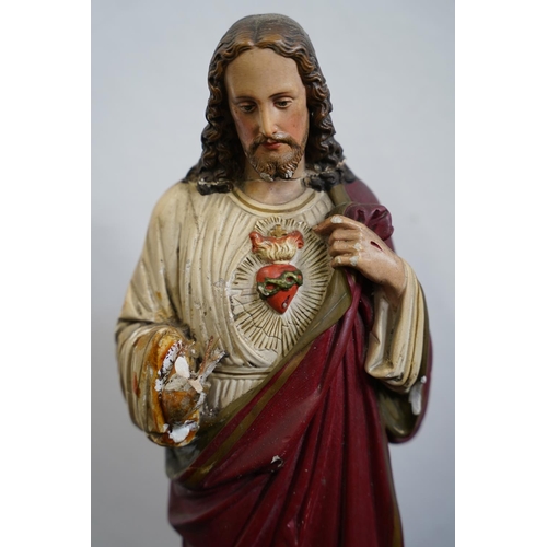 617 - A vintage Religious Statue of Jesus/ Sacred Heart, measuring 42cm in height.