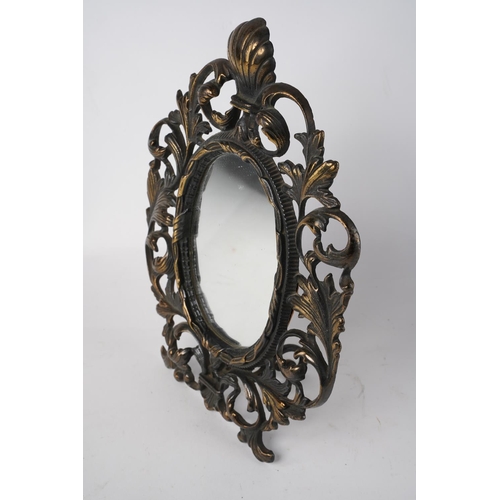 621 - A stunning metal framed mirror on stand, measuring 28x22cm.