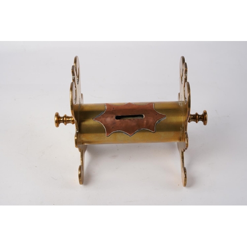 622 - An unusual antique copper and brass trench art money box on stand.