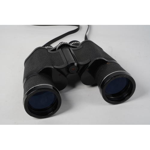 625 - A pair of Halina Sightsetter binoculars.