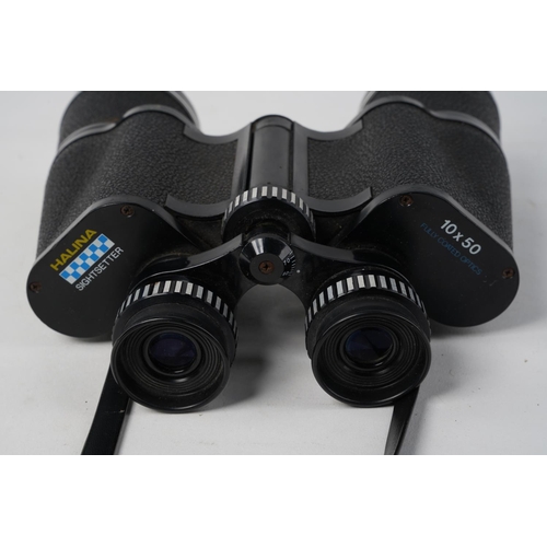 625 - A pair of Halina Sightsetter binoculars.