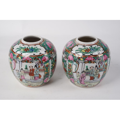 626 - A pair of Oriental patterned vases.