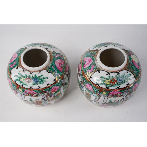 626 - A pair of Oriental patterned vases.