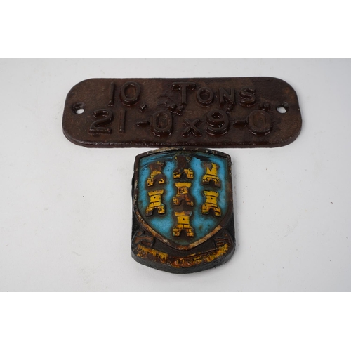 629 - A cast iron plaque '10 Tons 21 - 0 x 9 - 0' and Ballymena '7 tower' crest.