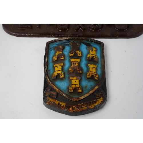 629 - A cast iron plaque '10 Tons 21 - 0 x 9 - 0' and Ballymena '7 tower' crest.