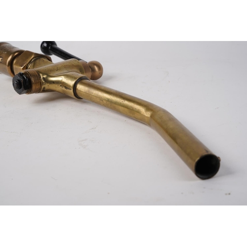 644 - An antique brass petrol pump nozzle.