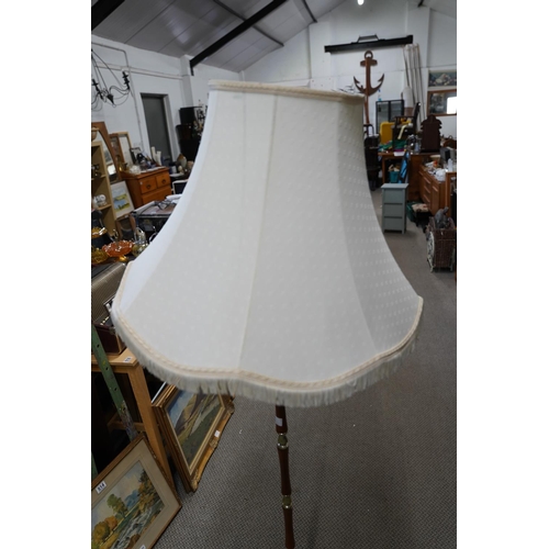 62 - A vintage standard lamp and shade