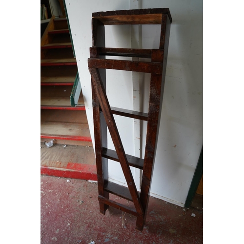 91 - A folding stepladder.