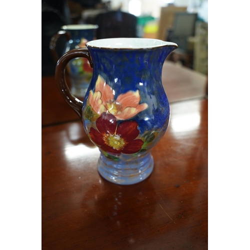 92 - A large stunning Royal Doulton floral patterned jug.