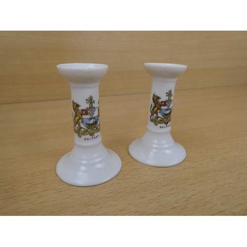 4 - A pair of Goss china candlesticks with the Belfast crest.