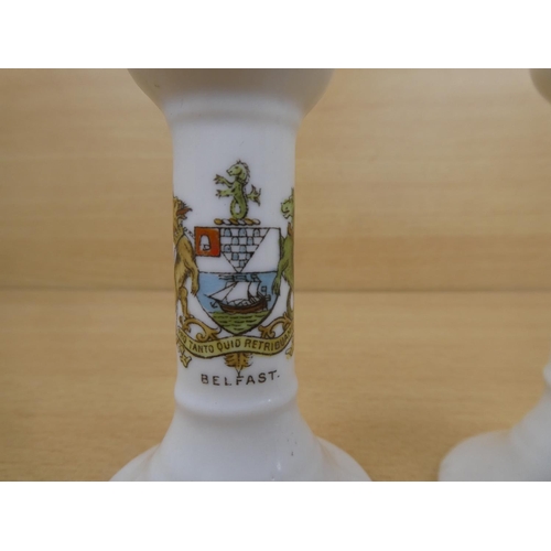 4 - A pair of Goss china candlesticks with the Belfast crest.