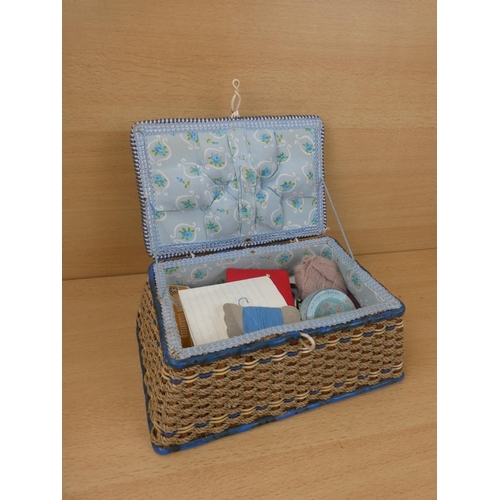 28 - A vintage sewing basket and contents.