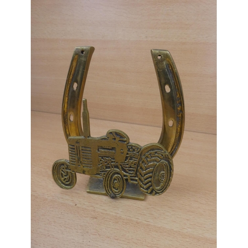 34 - A large brass horseshoe and tractor letter holder.