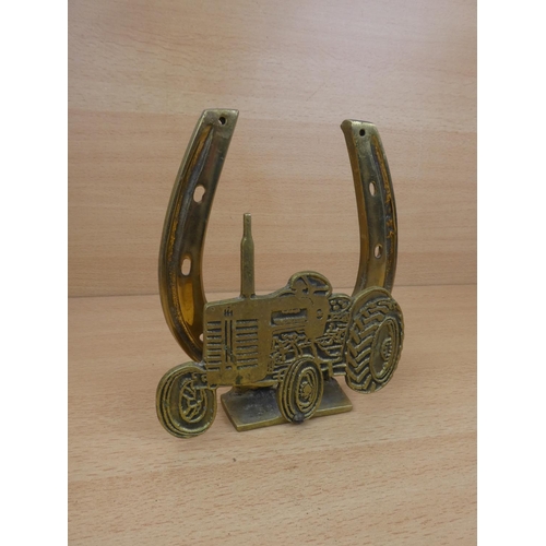 34 - A large brass horseshoe and tractor letter holder.