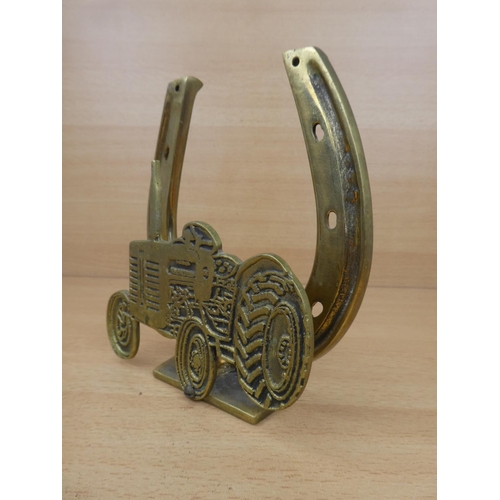 34 - A large brass horseshoe and tractor letter holder.