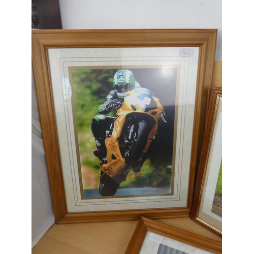 75 - Three framed motorbike racing pictures.