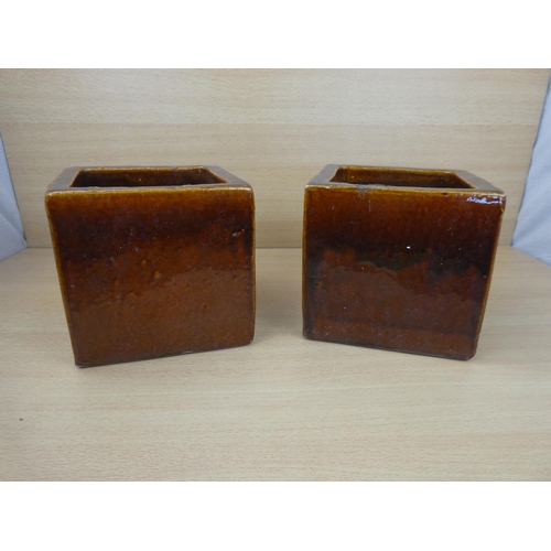 82 - A pair of glazed planters.