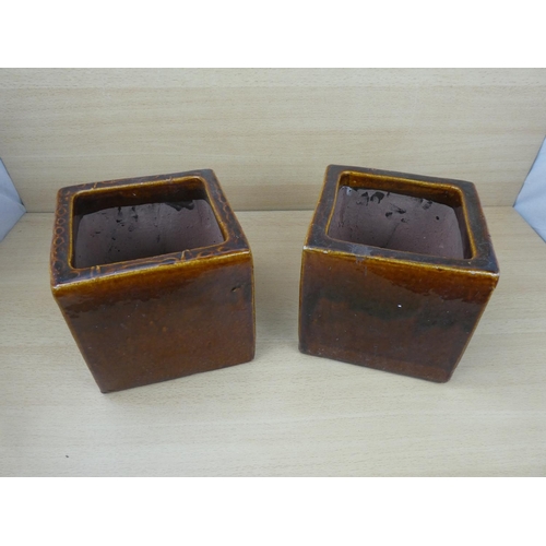 82 - A pair of glazed planters.