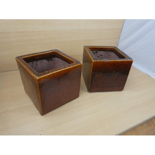 82 - A pair of glazed planters.