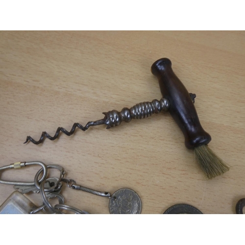 100 - A collection of assorted bottle openers, keyrings and more.