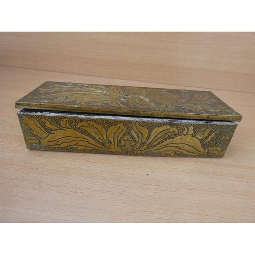 144 - A vintage brass patterned jewellery box.