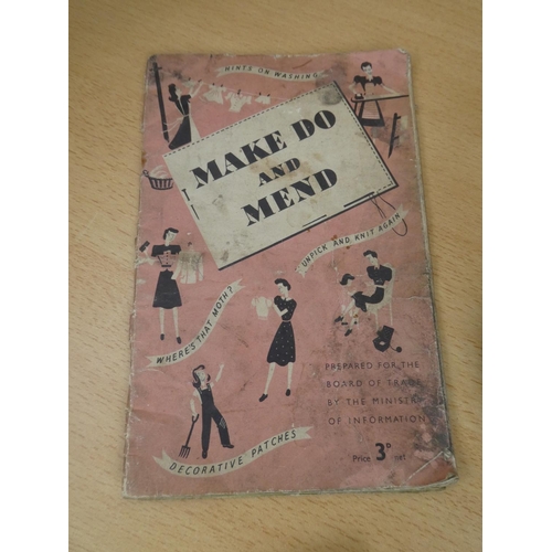 152 - A vintage tin and a lot of sewing thread and a Make Do and Mend booklet.