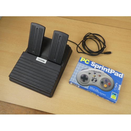 157 - A vintage boxed PC SprintPad Logic 3 control pad and a Logic 3 foot pedal.