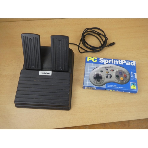 157 - A vintage boxed PC SprintPad Logic 3 control pad and a Logic 3 foot pedal.