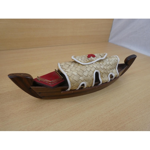 162 - A handmade wooden boat.