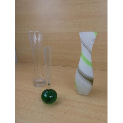 163 - A vintage green based bud vase and two others.