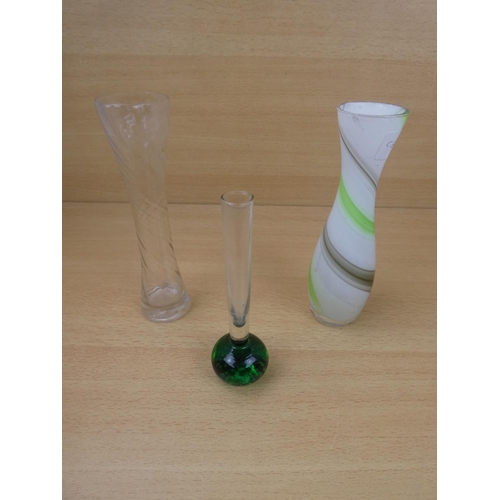 163 - A vintage green based bud vase and two others.